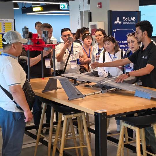 Professional delegation at an international trade show in Dubai | atravel.pro