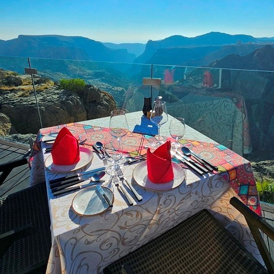 Exclusive fine-dining setup at a scenic viewpoint for VIP guests | atravel.pro